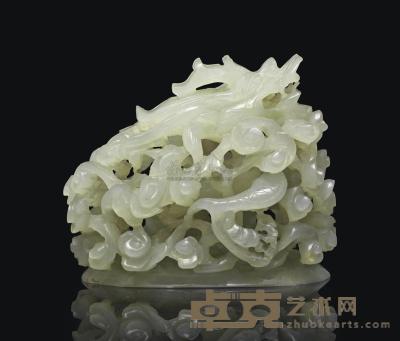 A CARVED AND RETICULATED WHITE JADE‘ DRAGON’ FINIAL 长5.7cm