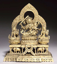 with date 1816 A Nepalese gilt bronze group depicting Manjusri with consort