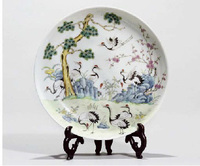 A famille rose ‘Cranes and Three Friends’ dish