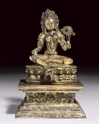 17th/18th Century A Nepalese gilt bronze figure of the Green Tara