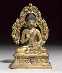 18th Century A Sino-Tibetan gilt bronze model of Buddha