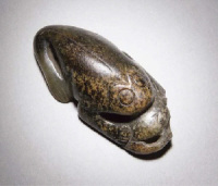 Ming Dynasty A Russet and celadon jade carving of a three legged toad