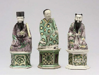 Kangxi Three famille verte biscuit figures of immortals