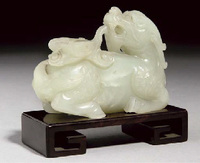 18th/19th century A pale celadon jade carving of a mythical beast