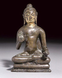 16th/17th Century A Tibetan bronze figure of Amoghasiddhi