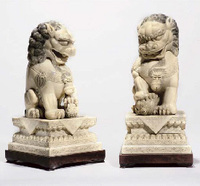 20th Century A pair of large ivory Buddhistic lions