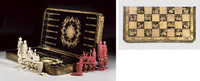 19th Century An export black and gilt lacquered games compendium with ivory pieces