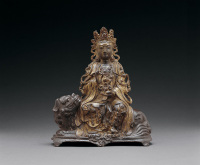 明中早期 漆金铜文殊骑狮座像