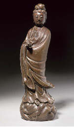 An silver inlaid bronze figure of Guanyin