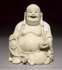 19th Century An ivory figure of Budai