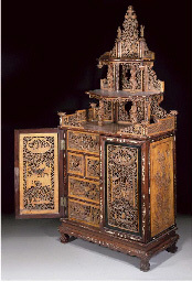 19th century A Canton carved and pierced wood cabinet