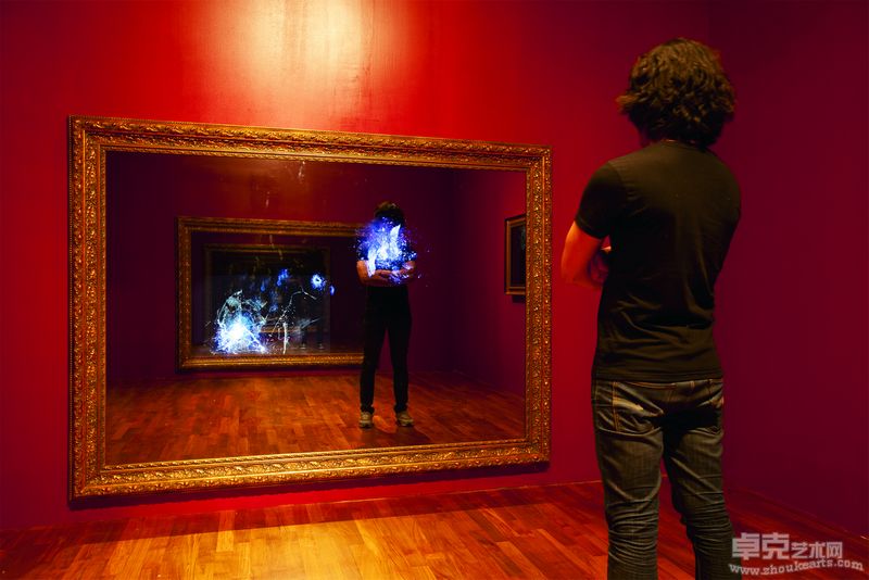 Broken Mirror, 2011, two 42 inch monitors, mac mini, mirror, stereo speakers, 250 x 183.5 x 8.5 cm