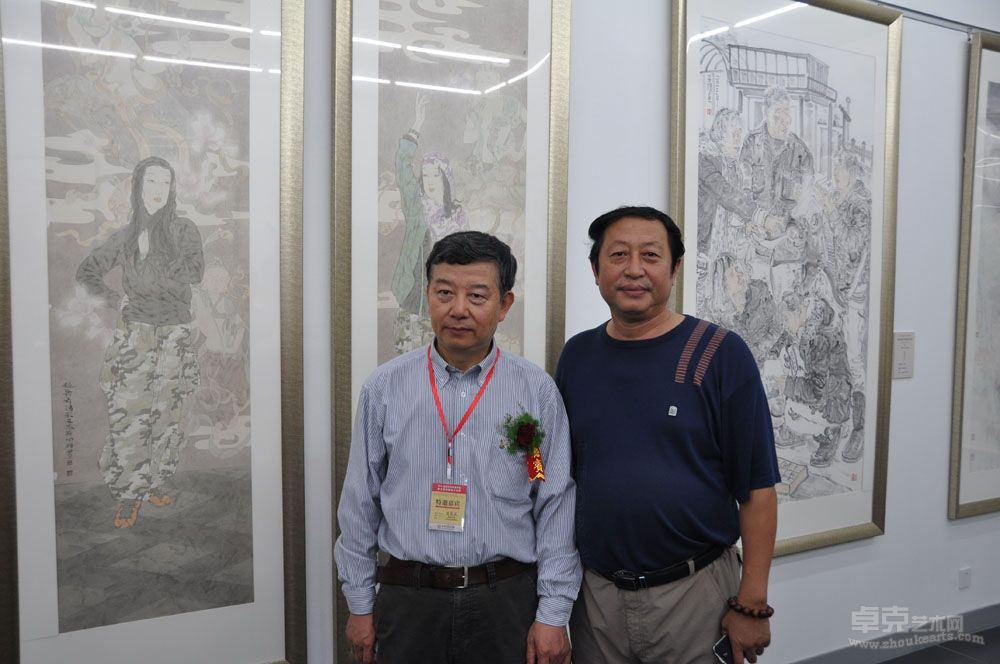 与中国美协分党组书记、常务副主席吴长江先生在美展会上