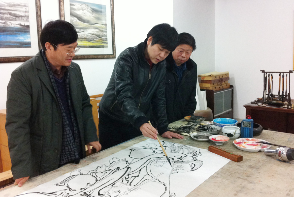 刘勇与同学画家唐天源、李士俊在一起