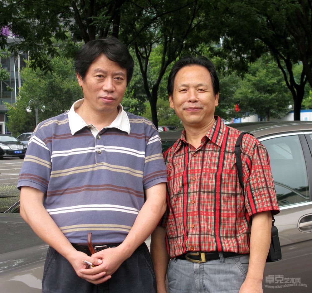 2011年8月与祁恩进（左）合影于北京现代工笔画院