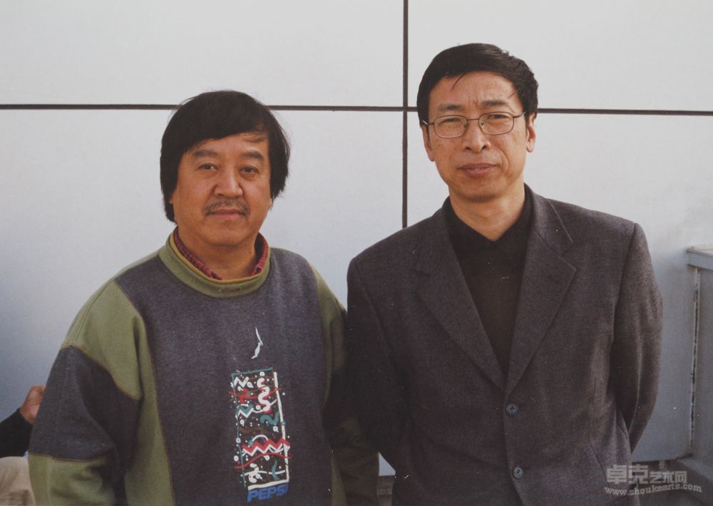 傅强和中央美术学院教授全国著名理论家殷双喜先生在全国高校美术工作会议上合影